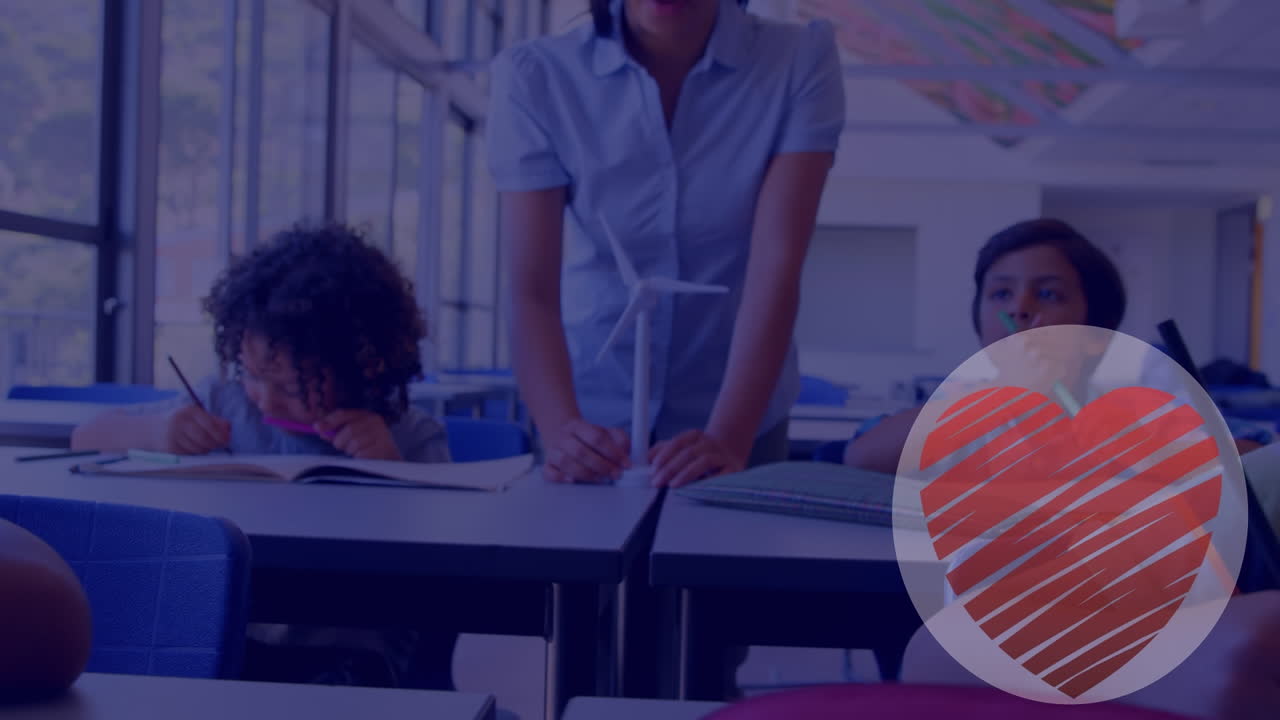 animación de corazón rojo sobre diversos escolares y maestros en el aula