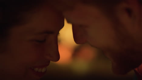 smiling couple faces romantic evening date closeup. lovers feel positive emotion