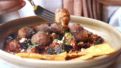 delicious meatballs with tomato sauce and vegetables