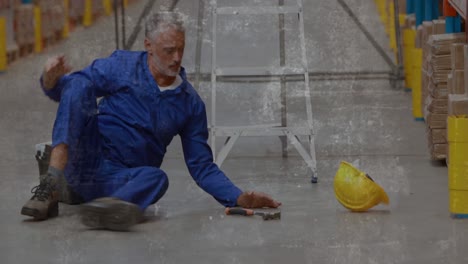 animación de formas que se mueven sobre la caída de un trabajador caucásico en un almacén