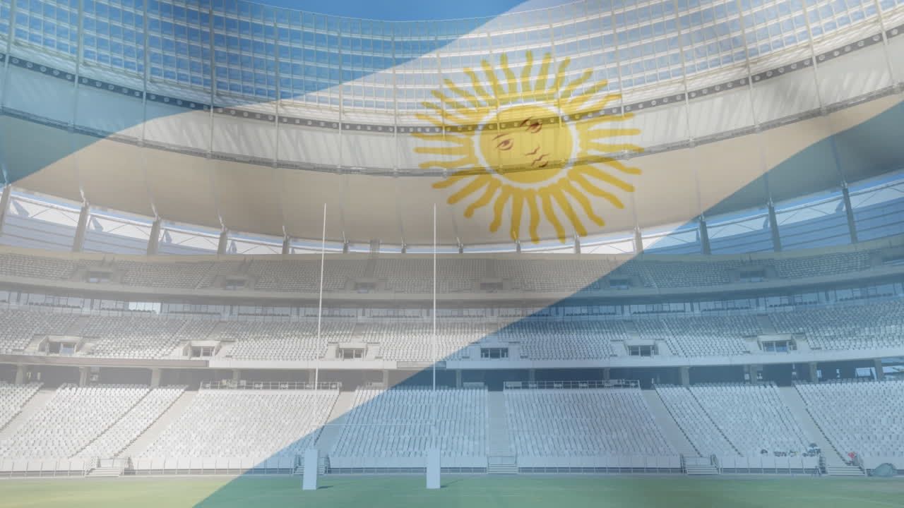 bandera ondeando frente a un estadio