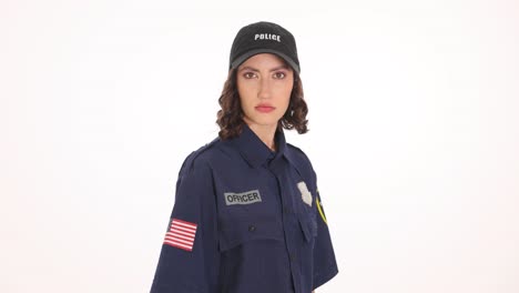 young woman police officer in uniform on white background