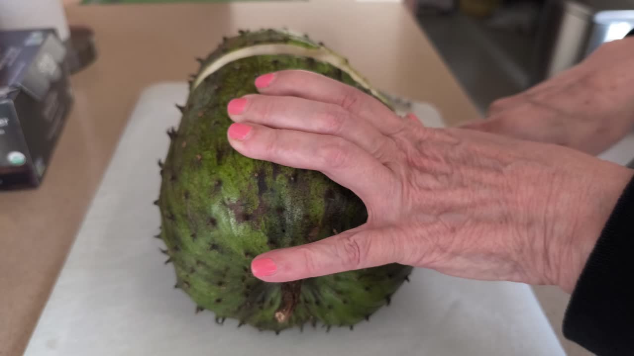 Cutting exotic fruit from central america