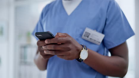 Hands,-phone-and-doctor-typing-in-hospital