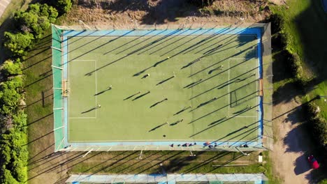 steady drone shot of a field hockey from above