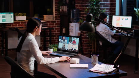 businesswoman talking with board of directors on videocall meeting