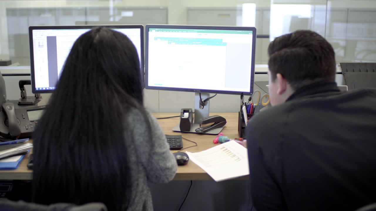 People working at their desk in the office