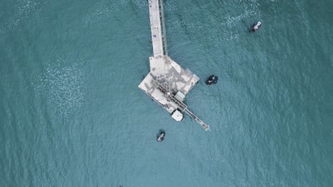 high view of a abandoned construction platform located out in the ocean