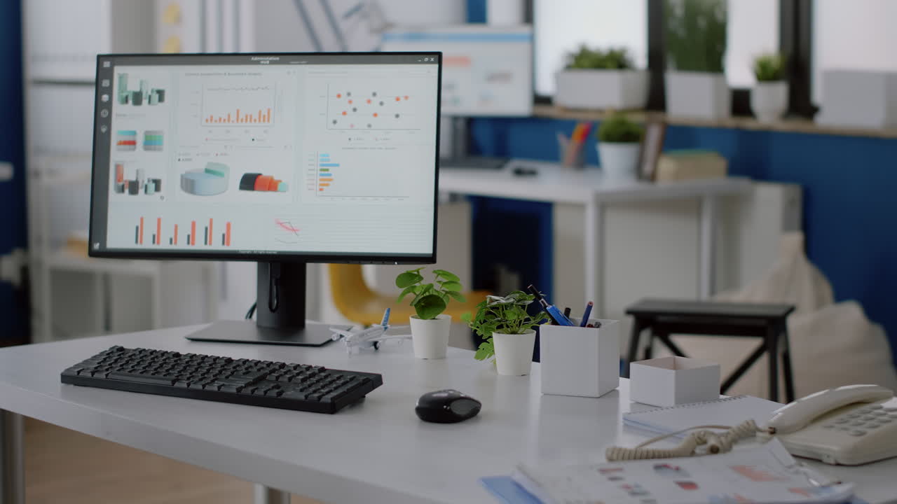 Nobody at desk in company office with computer and tools