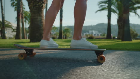 woman skateboarding in a park