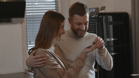 happy couple with keys