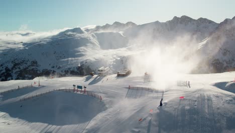 ski resort on top of a mountain, ski piste aerial push in