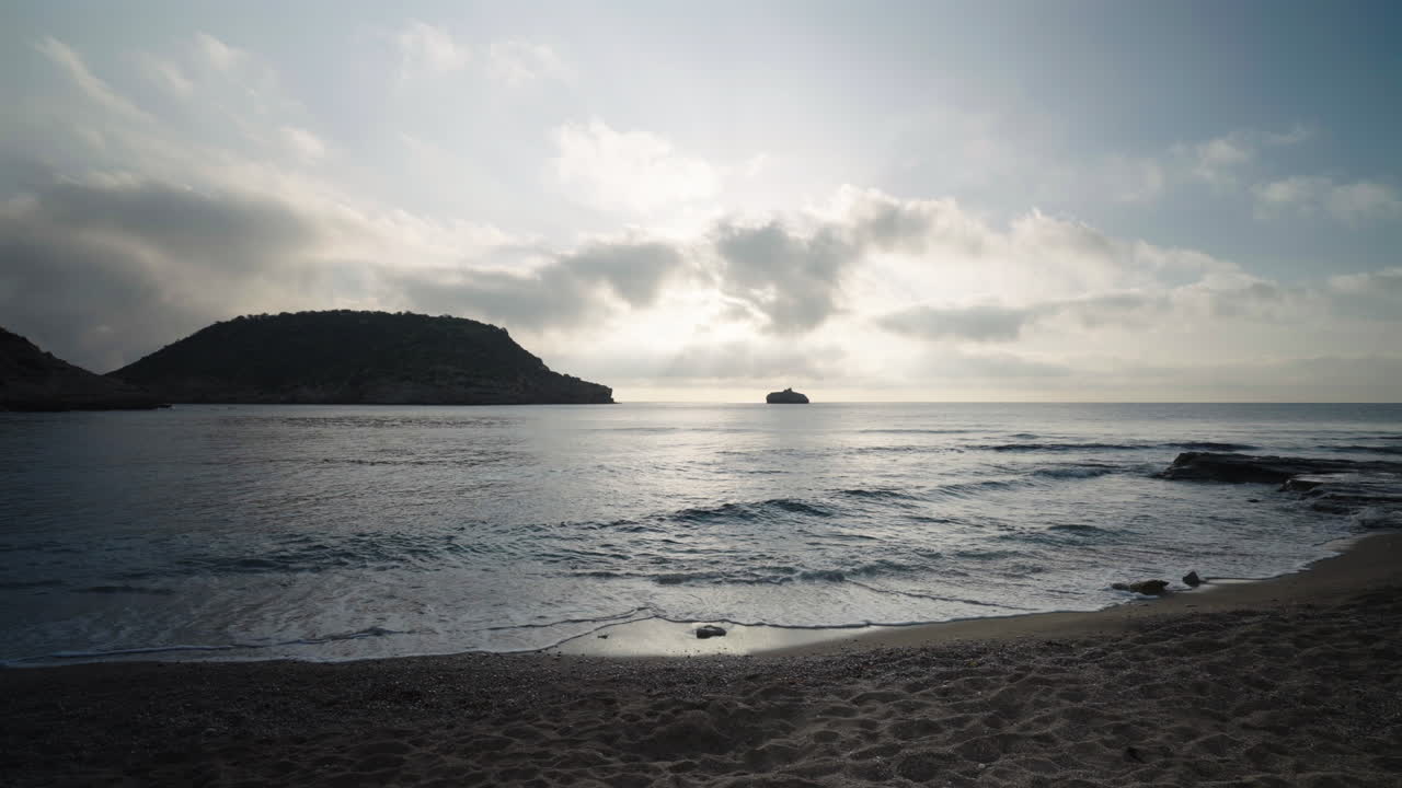 Landscape of Spanish Beach Cove with Rocky Shores, Mediterranean sea at sunset