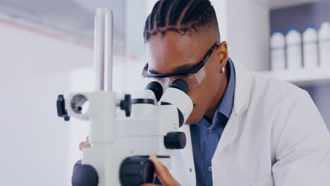 science, microscope and healthcare with a doctor