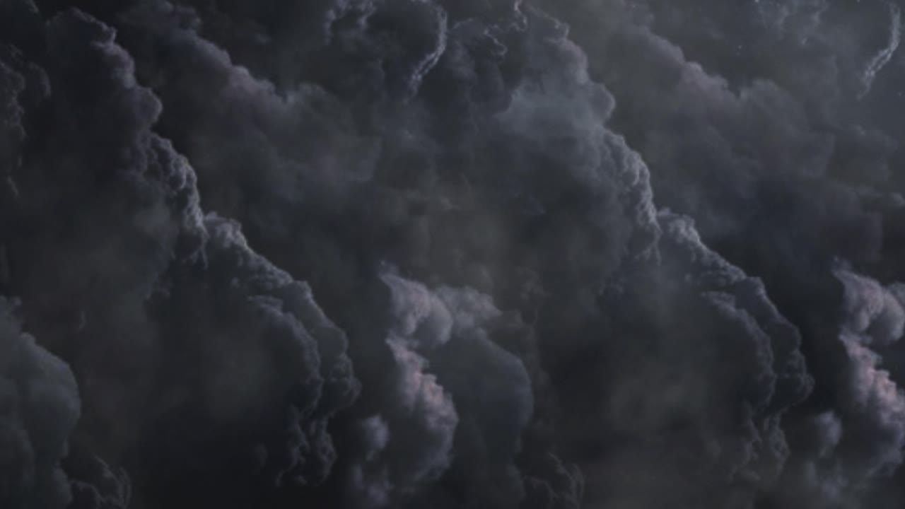 dark thick clouds covered the sky, a thunderstorm
