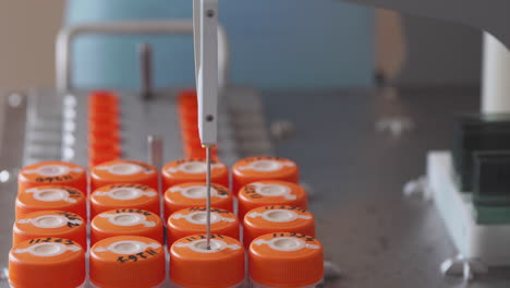 a closeup of the sterile medical lab machine performs the analysis automatically on detection of cancer by analysis of a puncture