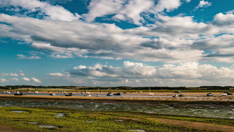 Dancing-boats-at-low-tide,-time-lapse-of-Blakeney-Harbour,-North-Norfolk-coast