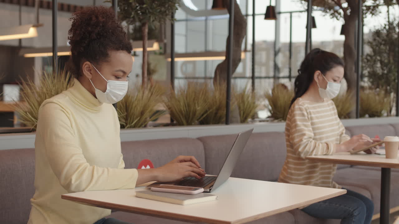 Young Ladies Working in Hotel Lobby