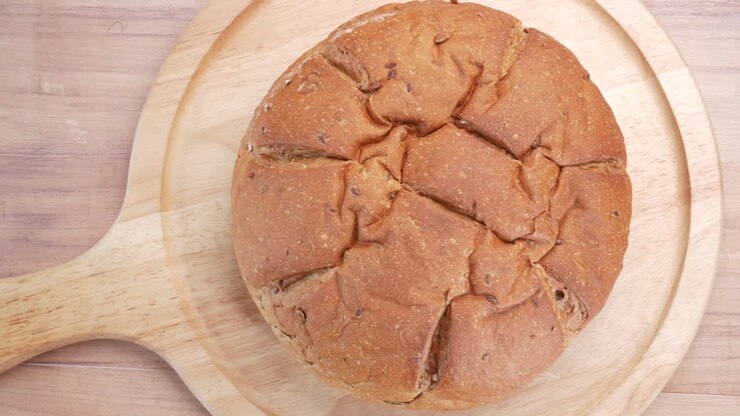 Detail shot of whole grain baked bread on table