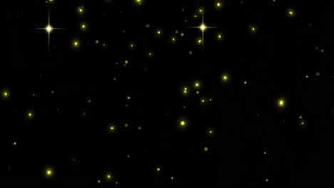 animation of glowing yellow spots falling on black background