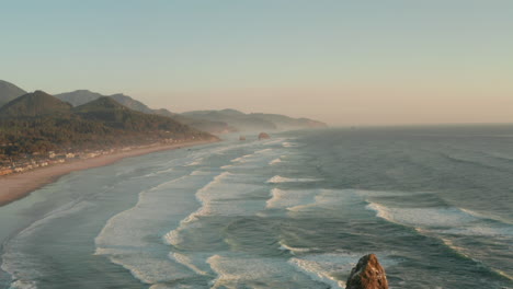 stationary aerial shot over waves on the oregon coast