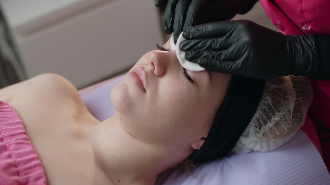 Woman Receiving Facial Treatment