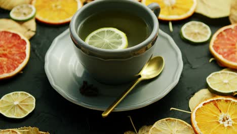 cup of tea with lemon and spoon