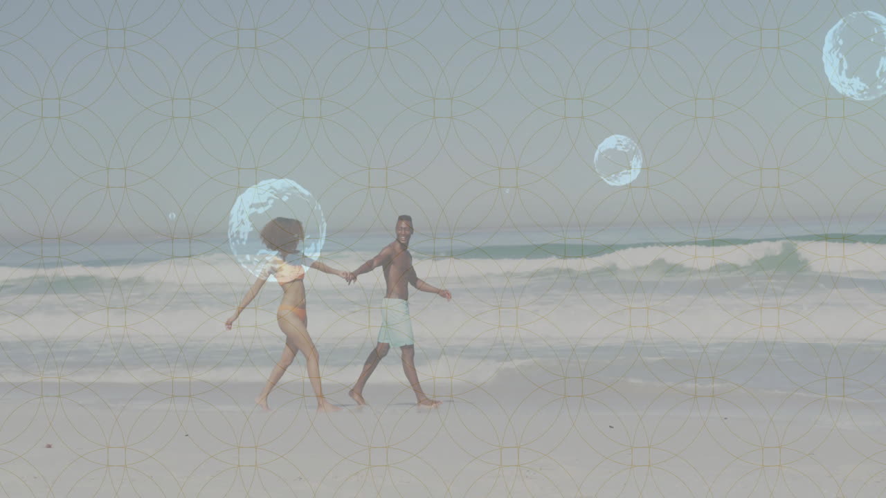 Holding hands on beach, couple with geometric pattern animation and bubbles overlay