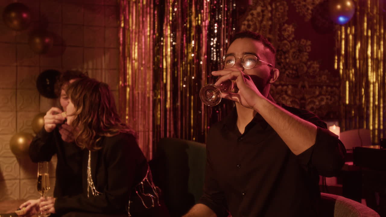 People celebrating at a party with champagne