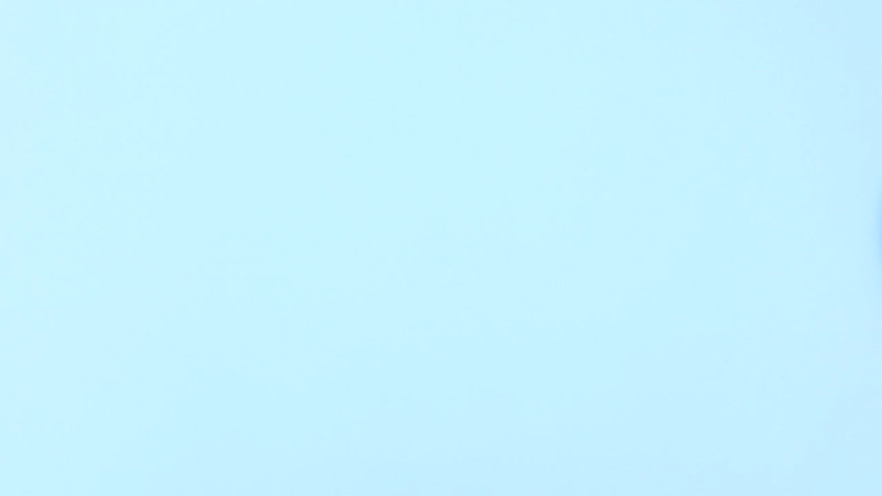 Delicious cookies in blue plate and milk in pink cup with wooden spoon ad supplies appear on right side . Stop motion