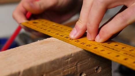 pencil markings on wood chunk for precise cuts