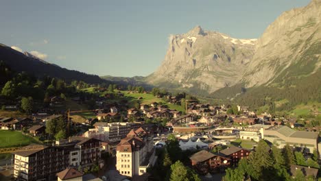 pushing out from grindelwald village centre with unique view of mount wetterhorn during eiger ultra trail