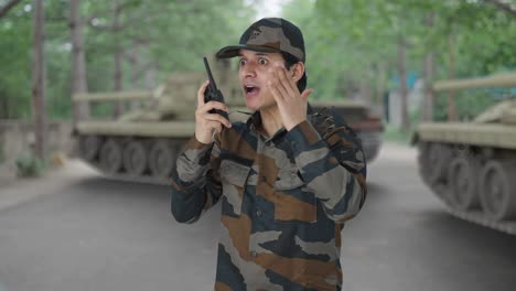 Angry-Indian-army-man-giving-instructions-on-walkie-talkie