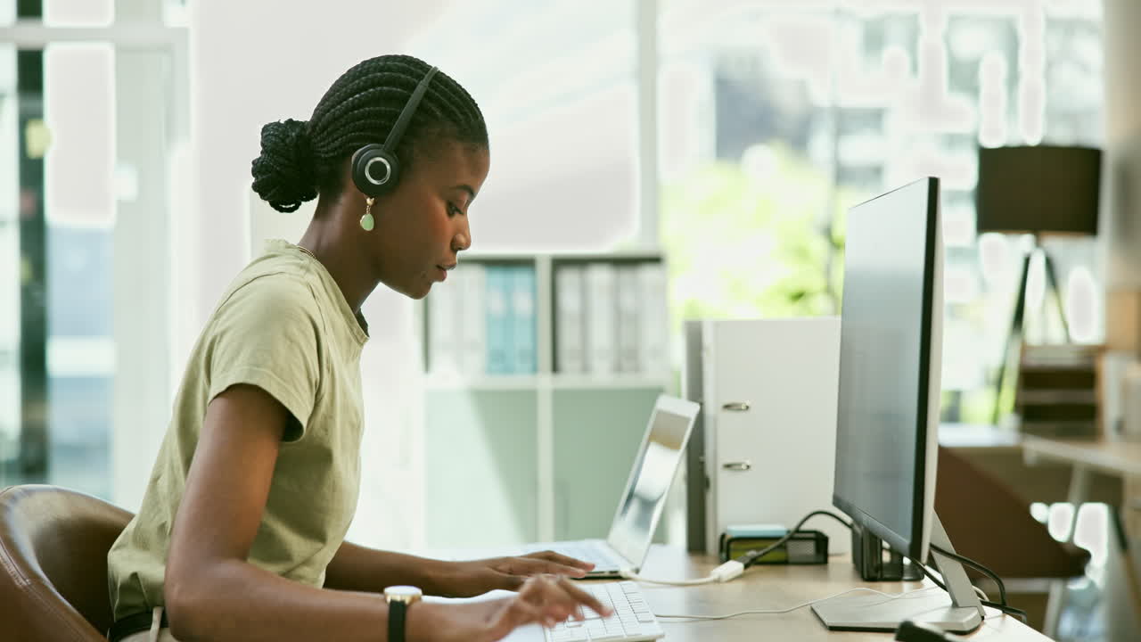 Woman working on computer in office