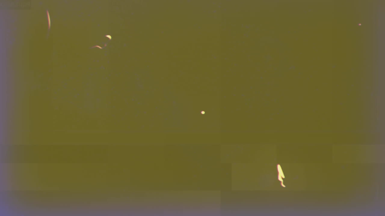 animación de múltiples manchas que se mueven en movimiento hipnótico en un fondo verde angustiado