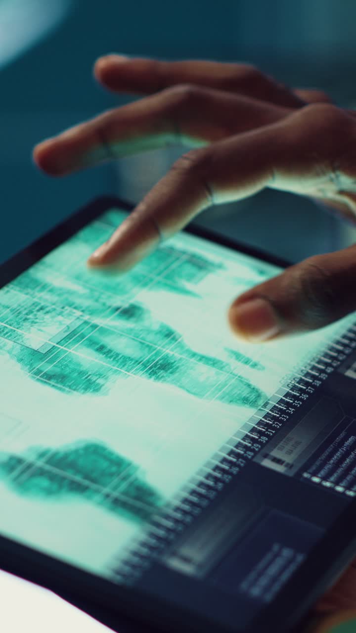 Close-Up of Hands Interacting with Digital World Map on Tablet