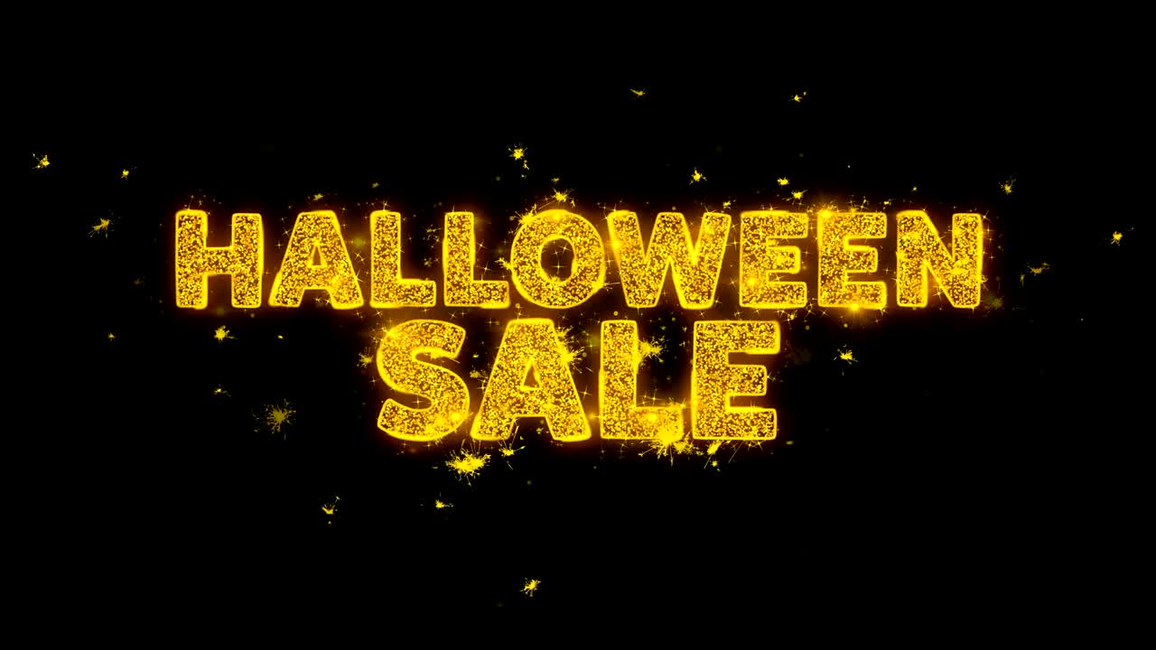 할로윈 판매 텍스트는 검은 바탕에 입자를 불꽃으로 만니다.