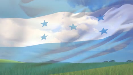 Digital-composition-of-waving-honduras-flag-against-view-of-farm-field-landscape