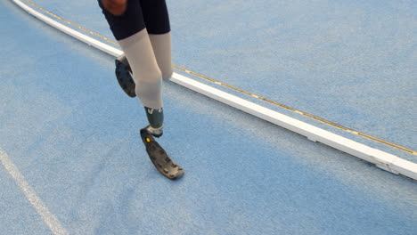 disabled athletic running on a running track 4k