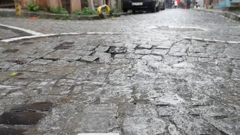 rainy cobblestone street in old city