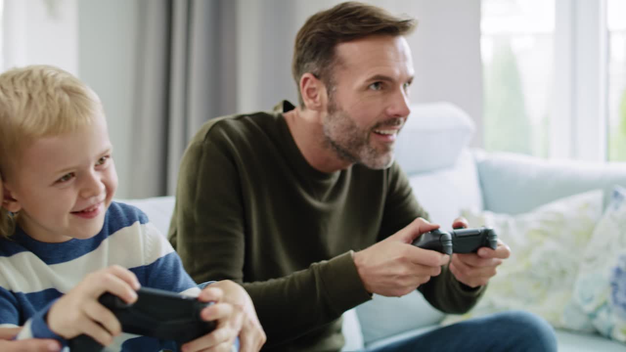 Family playing video game together