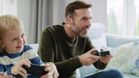 family playing video game together