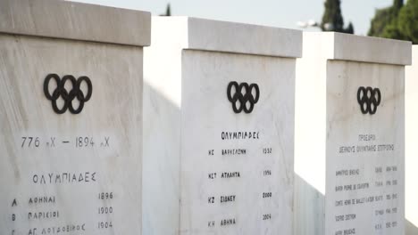 Shot-of-Olympic-statues-in-the-Panathinaikos-stadium-in-Athens,-Greece