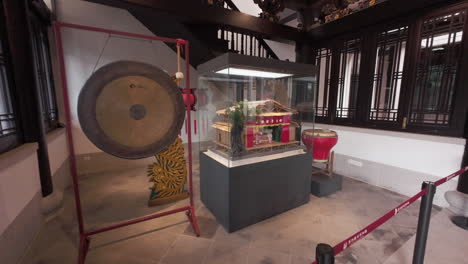 exposition model of an old chinese opera theatre with huge gong drum in the exhibition hall at chinese opera centre in guangzhou, china