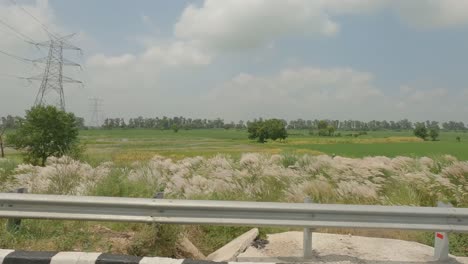 a beautiful timelapse of a vehicle riding through the western peripheral 6-lane expressway inaugurated by prime minister of india shri narendra modi