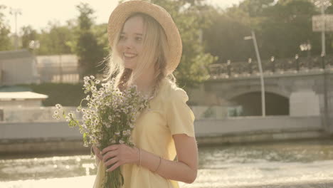 woman with flowers in a park