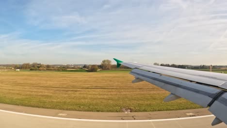 airplane landing from riga airport to munich international airport in germany. pov shot