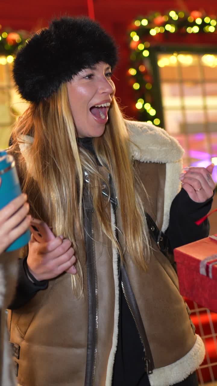 People exchanging Christmas gifts