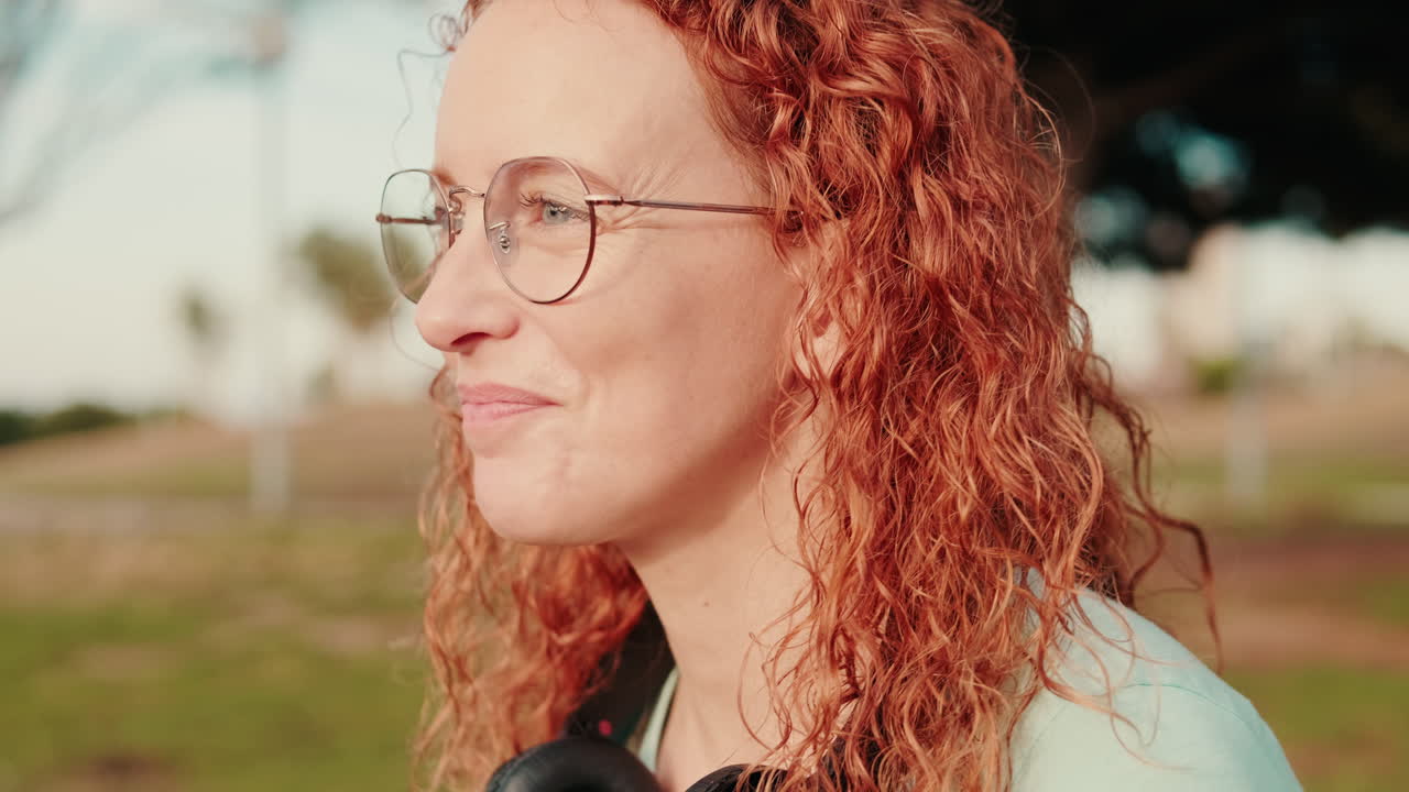 Happy Woman Smiles at a Picnic in the Park