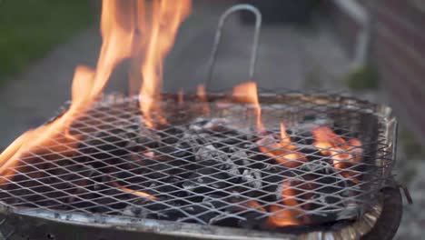 close view of a small barbecue with fire